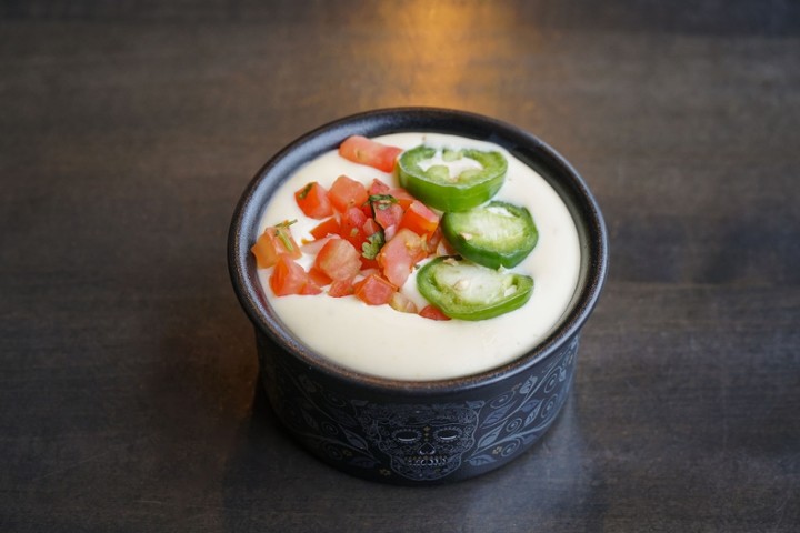 Side 4oz Queso (No Chips)*