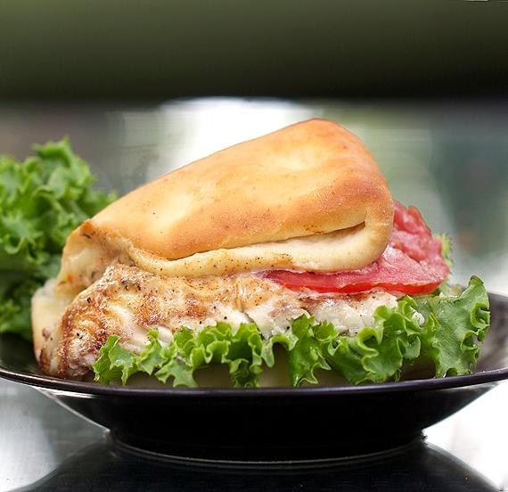 Grilled chicken coco-bread sandwich.