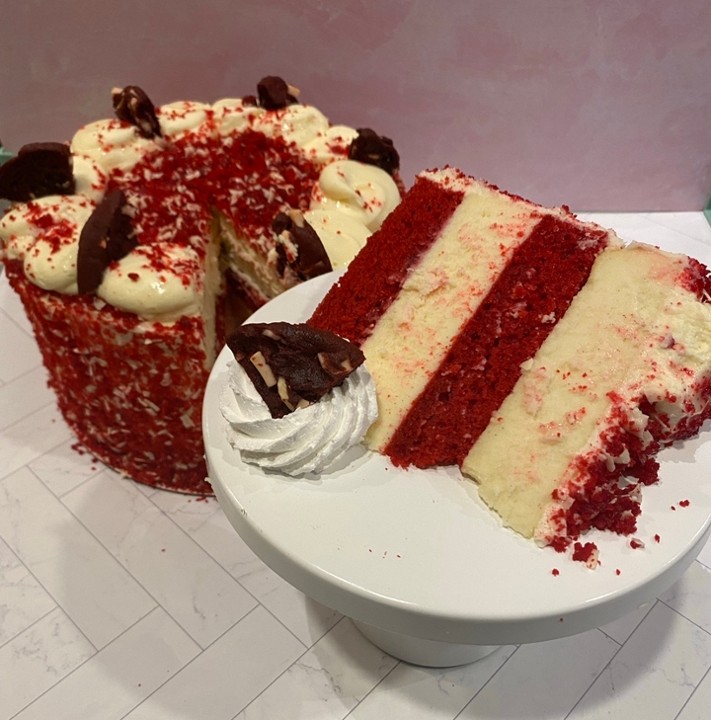 Radiant Red Velvet Ultimate Cheesecake Slice