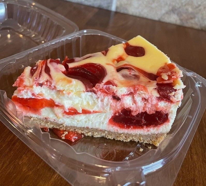 Slice of Strawberry Swirl Cheesecake