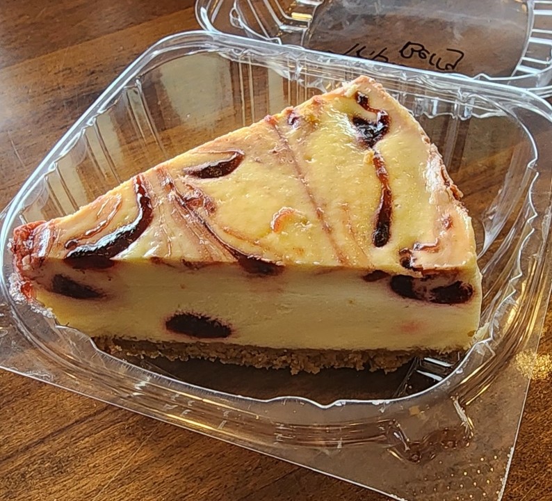 Slice of strawberry swirl Cheesecake