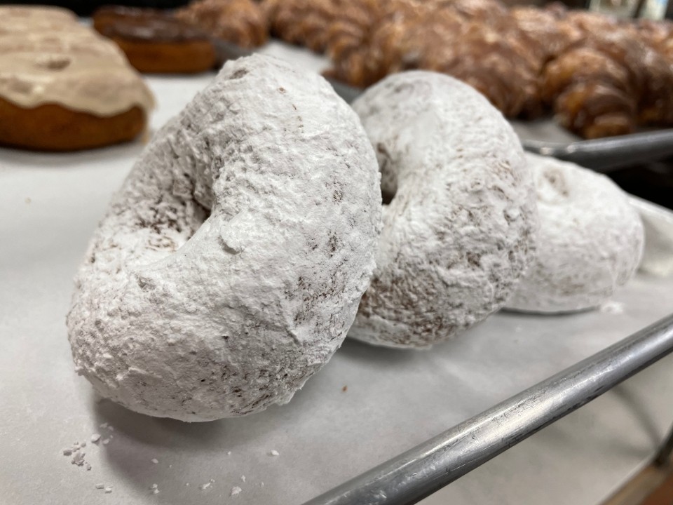 Cake Donut Rolled in Powdered Sugar