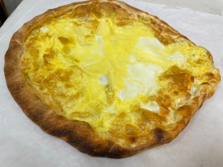 EGGS BAKED OVER DOUGH