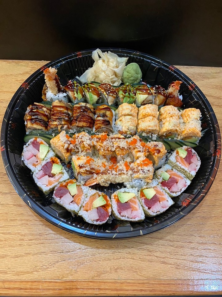 Party Tray B 9 pcs sushi, 12 pcs sashimi, 1 California, 1 spicy tuna, 1 rainbow, 1 green dragon