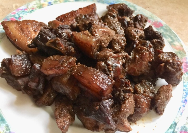 Jerk Pork w/ rice and Peas