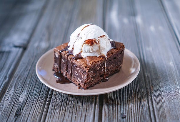 DARK CHOCOLATE BROWNIE WITH VANILLA ICE CREAM