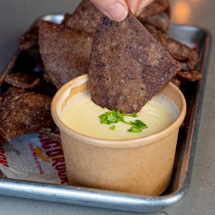 Puff Chips w/ Queso.