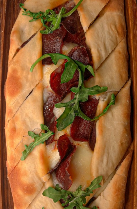 Cured Beef Pastrami & cheese flat bread