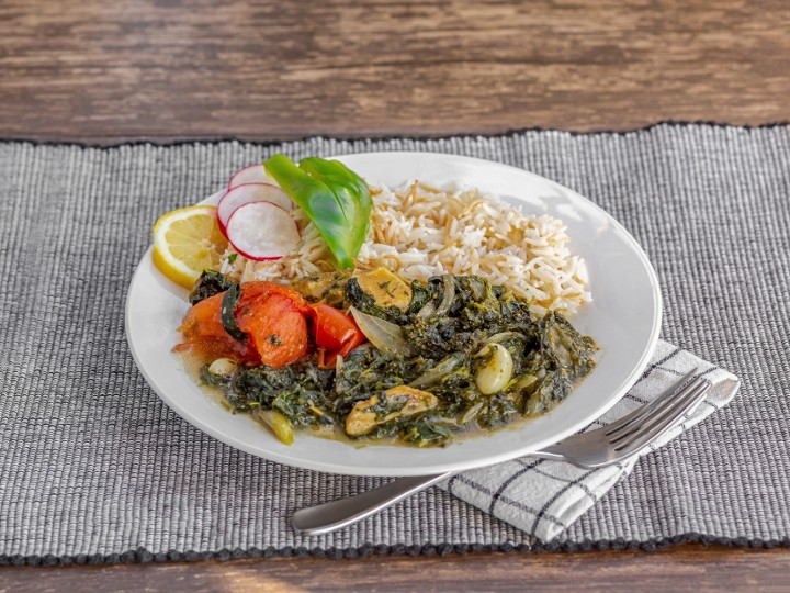 MLOUKHIYE "GARDEN MALLOW LEAVES SIMMERED WITH CHICKEN, GARLIC LEMON JUICE AND TOMATOES) "SERVED WITH RICE"