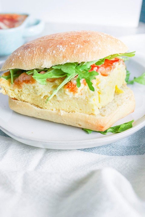 TOKA Breakfast Sandwich- Egg, avocado, gouda, tomato and Micro Greens on Ciabatta