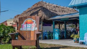 FINS Seafood and Dive Bar 3422 Del Prado Blvd S