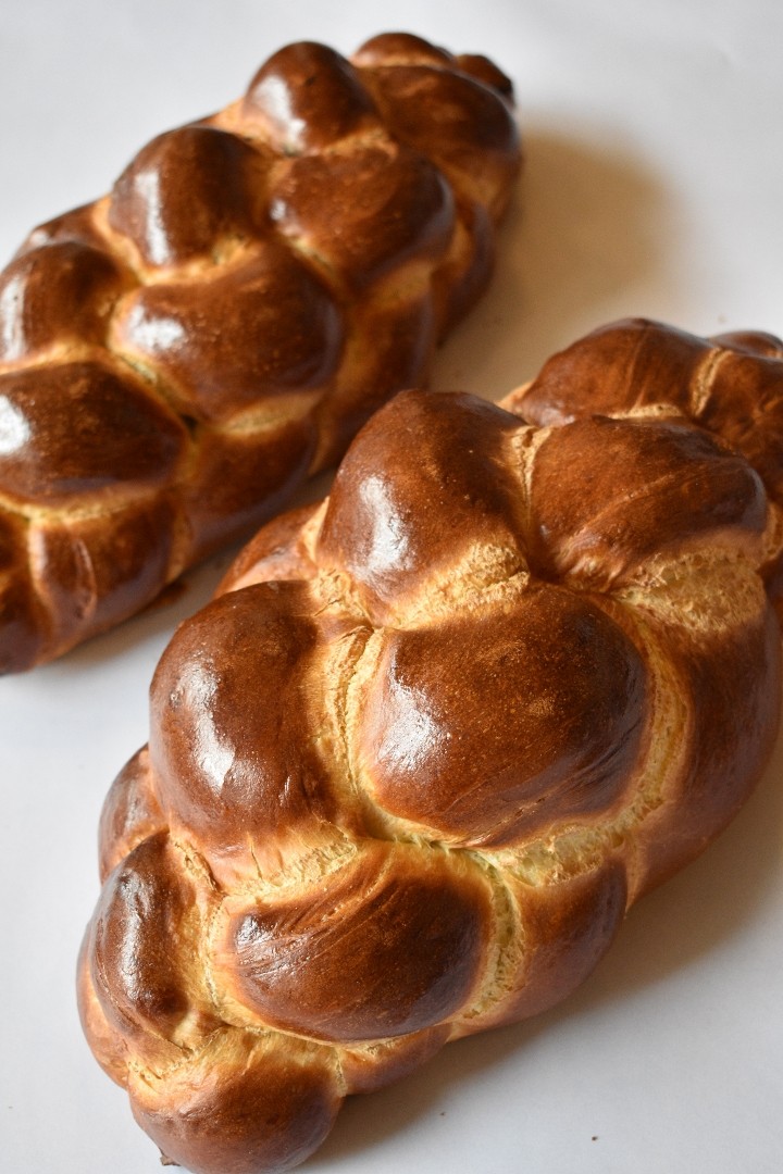 Challah a little too big for the pan but smells great! : r/Breadit