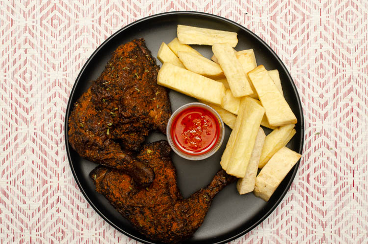 Chicken Suya with fried yam and peppersauce