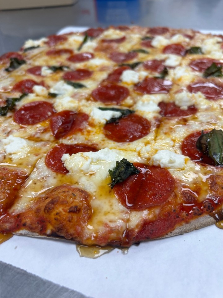 Hot Honey Pizza--pepperoni, ricotta cheese, fresh basil drizzled with hot honey