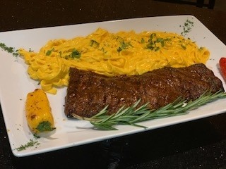 Fettuccini a la Huancaina, with Entraña Steak Anticuchera