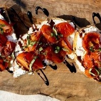 Charred Tomato + Herbed Ricotta Toast