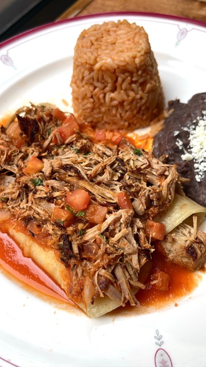 Red Enchiladas Rancheras (Carnitas / Mexican Pulled Pork) - Carnitas are on top and filled with cheese.