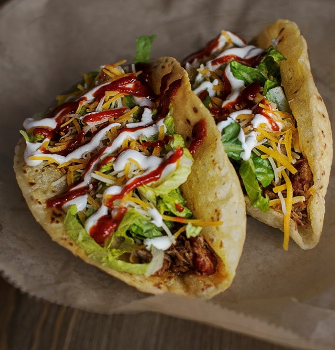 Taco ~ pulled pork, chicken or barbacoa beef