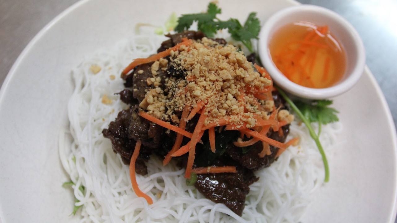 grilled beef slices over rice vermicelli noodle