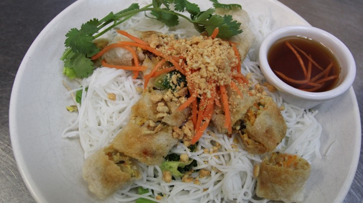 crispy vegetarian spring rolls over rice vermicelli noodle