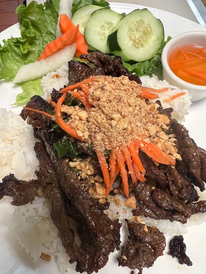 grilled beef slices over rice