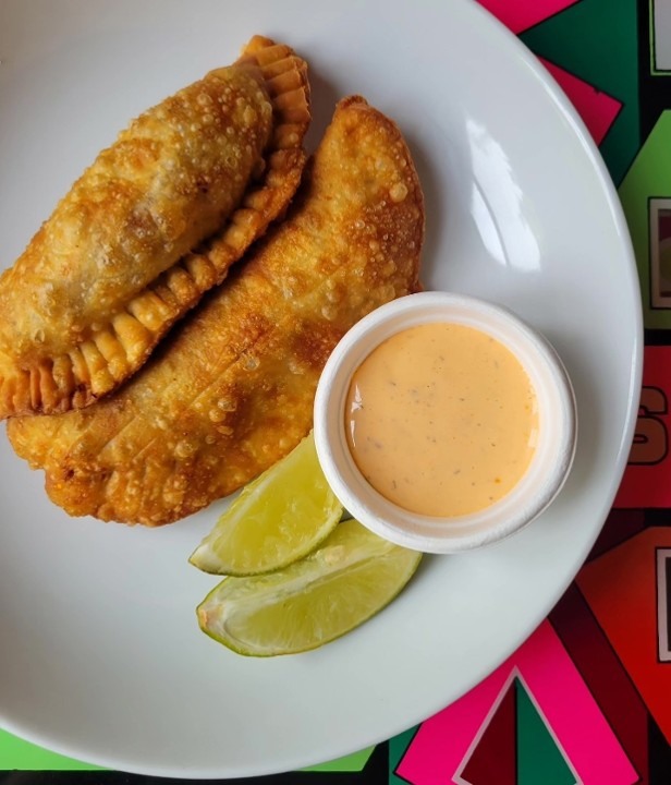 Pork Empanadas - Ground Pork & Chorizo Filling, American Cheese, served with Garlic Habanero Sauce