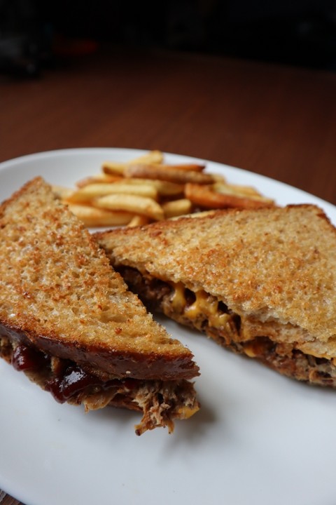 Pulled Pork Cheese Melt - Wheat Berry Bread, American Cheese, Fried Onions, Sweet and Smoky BBQ