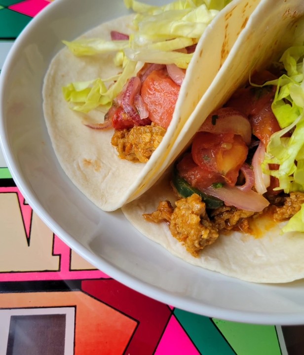 Decades Tacos (2) - Ground Pork & Chorizo, Flour Tortillas, Shredded Lettuce, Lime, Corn Salsa