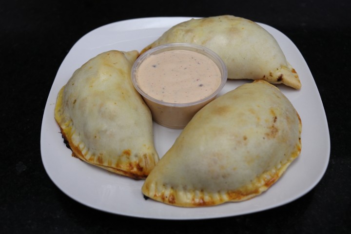 1 Baked Chicken Empanada - Comes with 1 set of sauces