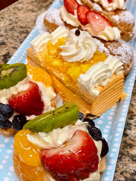 All About Fruits- (4 Fresh Strawberry Éclair 4 Fresh Fruit Tartlet 4 Mango Cake Slice)