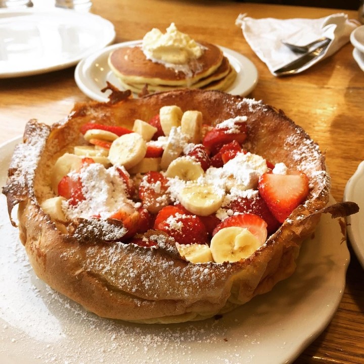Dutch Baby with Fresh Bananas and Strawberries
