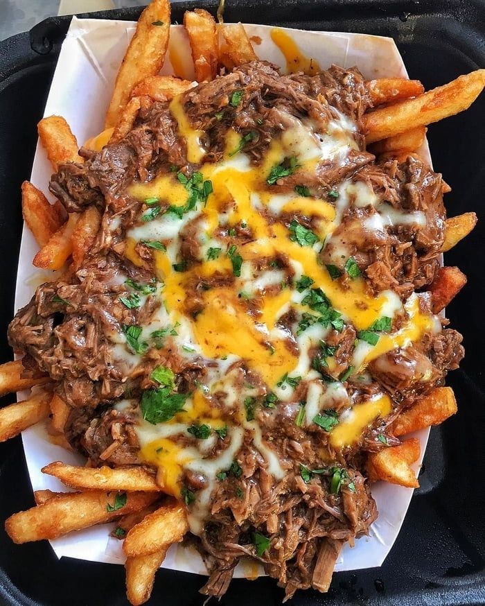 FRIES, LOADED PULLED PORK  our delicious crispy fries loaded with mozzarella, cheddar, pulled pork with bbq drizzle