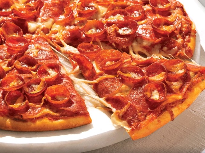 SWEET & SPICY TRIPLE PEPPERONI loaded with our delicious pepperoni, topped with Mike's Hot Honey drizzle, Parmesan & Oregano
