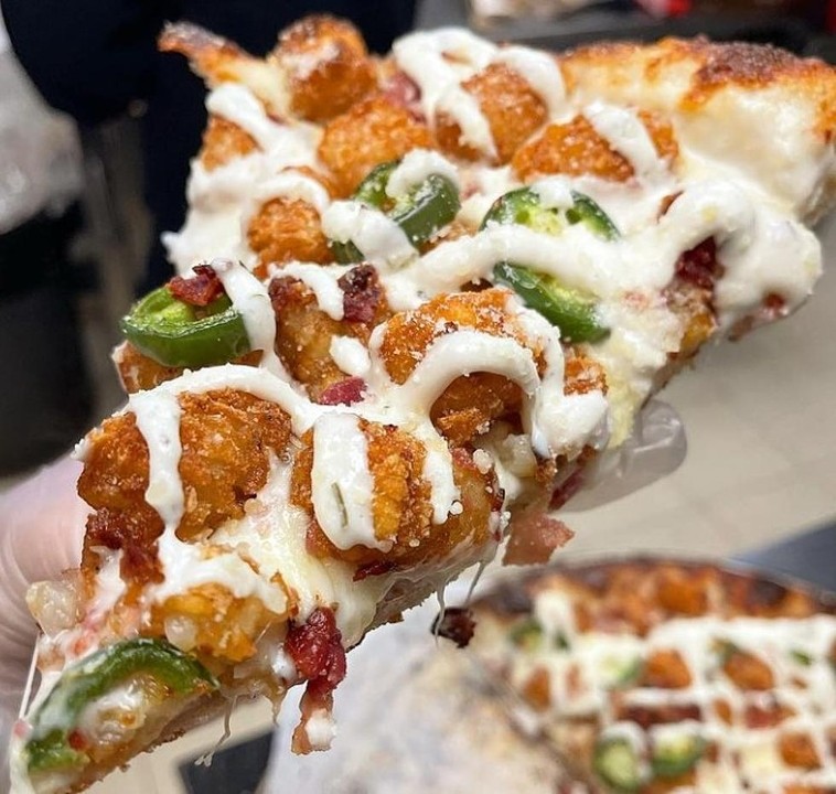 MOBILE ranch, french fries, breaded chicken tossed in hot sauce, mozzarella, cheddar, jalapeno, ranch drizzle
