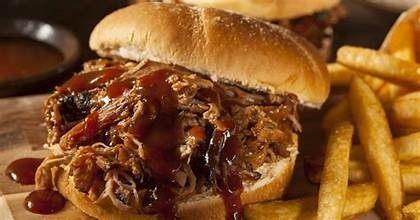 PULLED PORK SAMMY ~ Our Delicious Slow Smoked Pulled Pork Served with Fries, Coleslaw & Garlic Toast