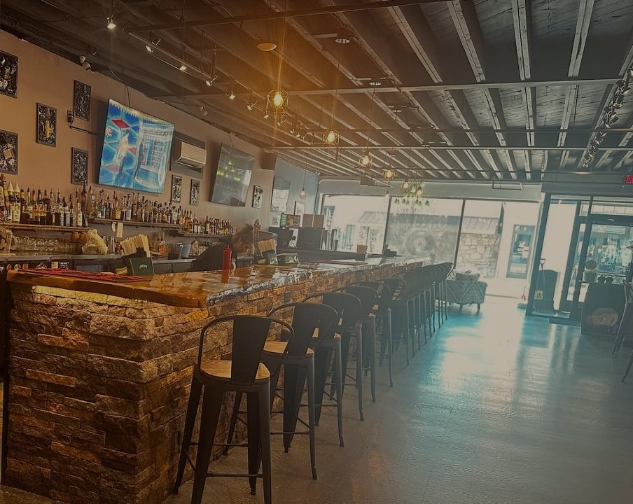 On Cue Sports Bar & Grill 206 E. Main Street