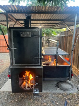 Nellys backyard bar b q catering