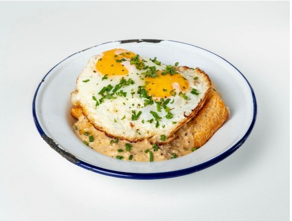 Biscuit and Sausage Gravy with Sunny Side Eggs
