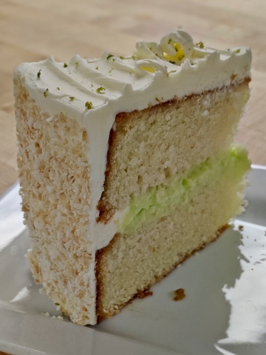 Cake: Coconut Cake with Lime Buttercream, Lime Curd and Toasted Coconut (Slice)