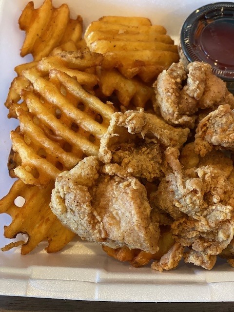 Chicken Nuggets (boneless fried chicken) and Waffle Fries...