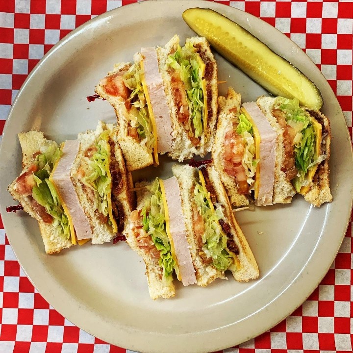 • Club Sandwich  Ham or Turkey w/ cheese, bacon, lettuce, tomato & mayo w/ peach half