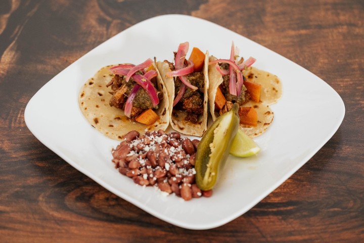 Barbacoa Beef Taco, Mayocoba Beans, Salsa Quemada, La Mesa Tortillas, Naked Jalapeno