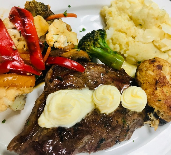 New York Strip Steak with potato and veggie of the day