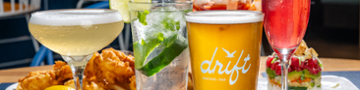 Drift Seafood & Bar Muse Pizzeria & Arcade- Grub