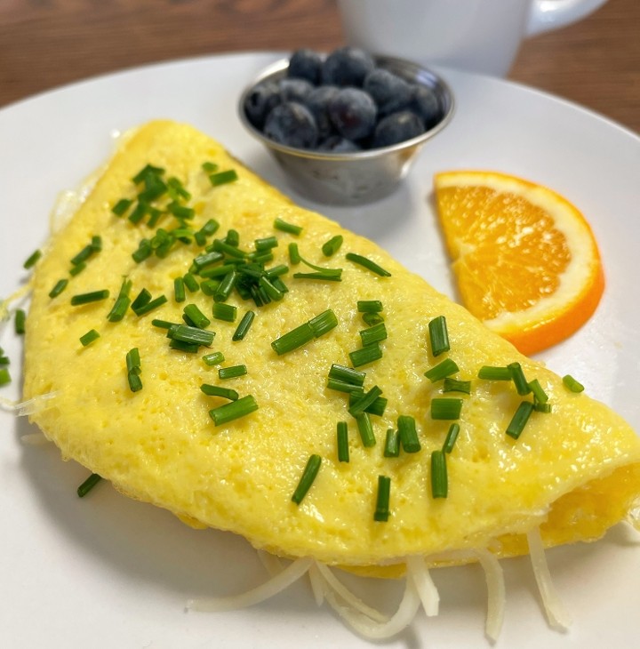 French Omelet with small side blueberries