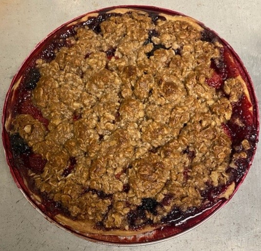 Berry Crumb Pie w/scoop of vanilla ice cream