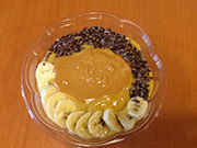 AUSTIN'S POWER BOWL - banana, mango, plant-based protein, packaged almond milk.  Topped with banana, nibs, & PB