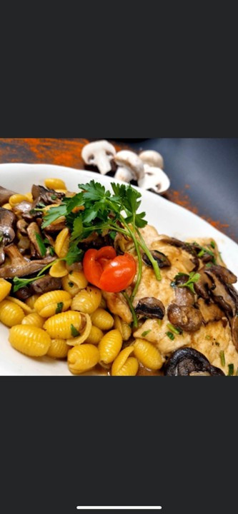 Chicken Marsala over House Made Pasta