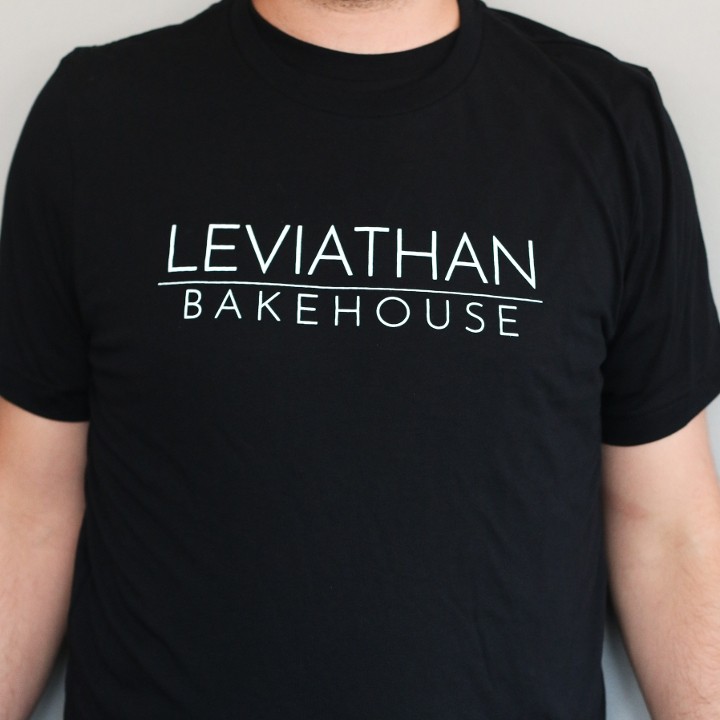 "Leviathan Bakehouse" Text Logo T-Shirt [Black]
