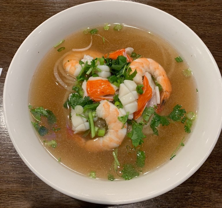 30. Seafood with white Noodle and chicken broth
